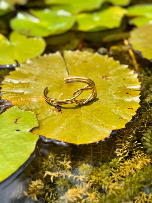Golden Knot Cuff – A Timeless Symbol of Unbreakable Bonds